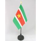 Drapeau de table Suriname 15x10 cm Hampe et socle en plastique noir pointe or